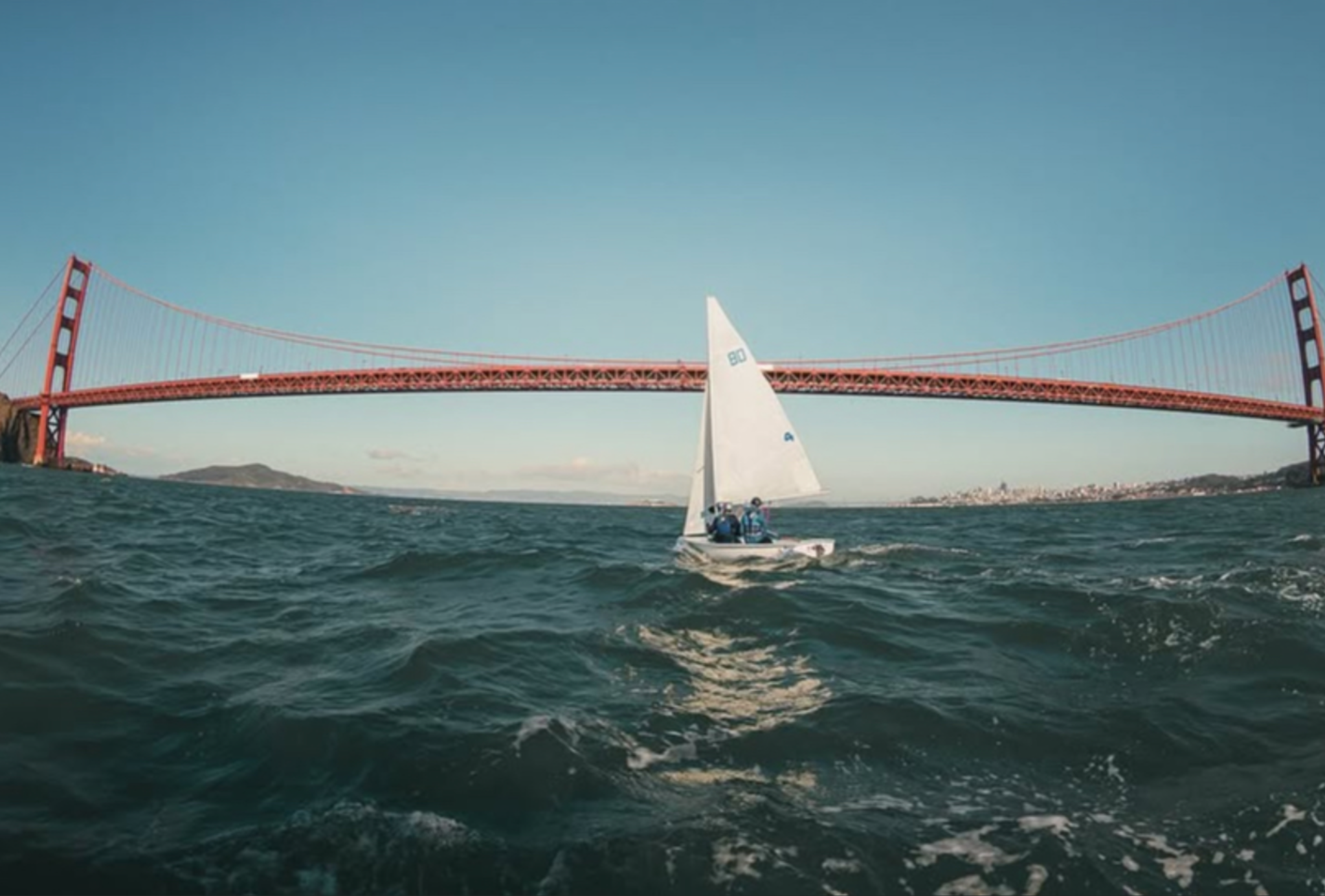 FJ sailboat sailing beneath the Golden Gate Bridge